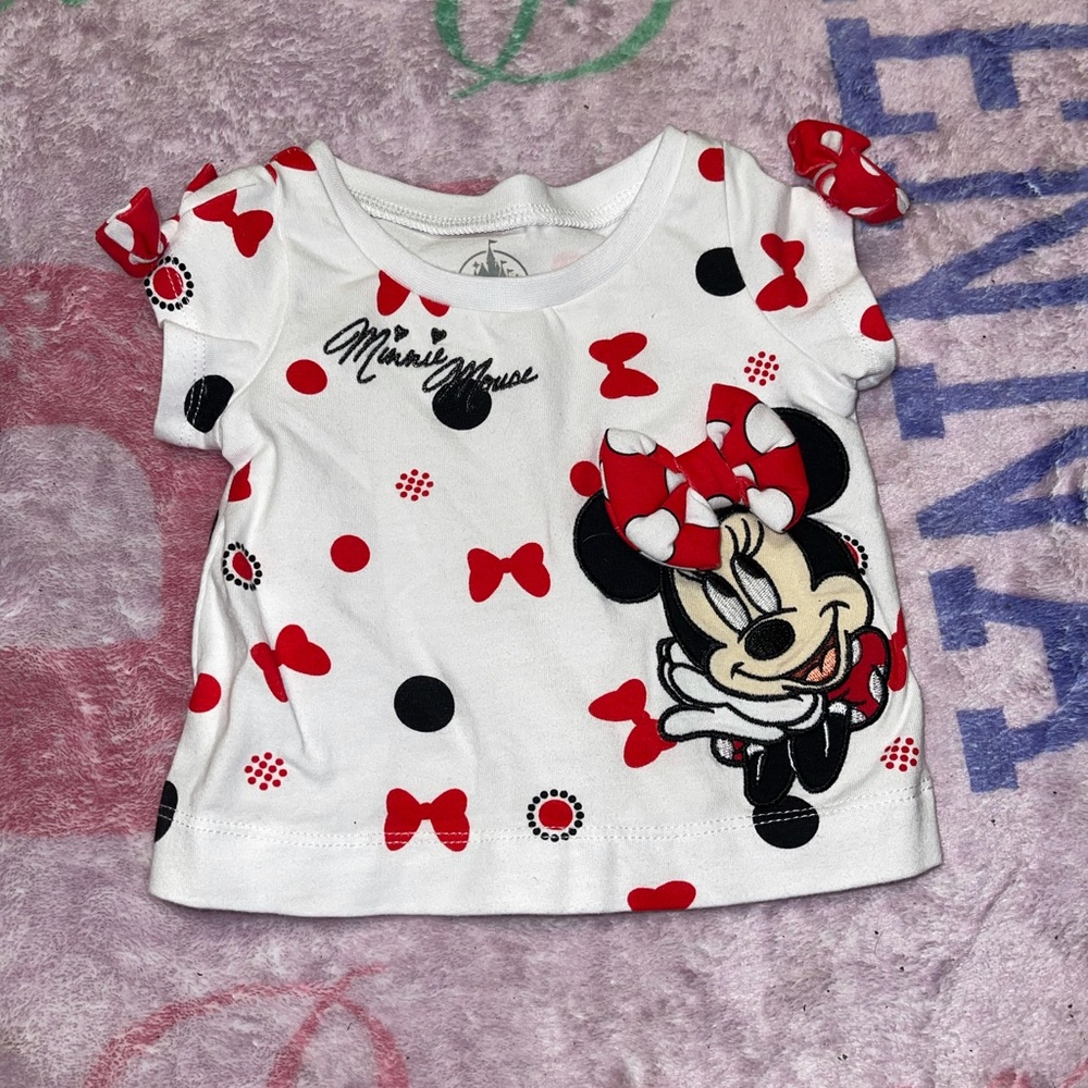 Minnie Mouse shirt.